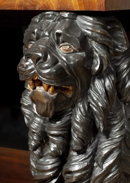 Empire Console table with carved wooden lions close up