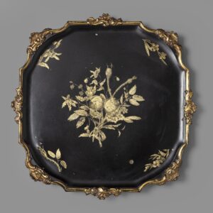 A Dutch Louis Quinze black and gilt-lacquered pewter salver