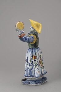 Delft figure playing the tambourine side Delft figure playing the tambourine side